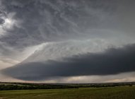 Bell shaped updraft of rotating supercell over rural area — Stock Photo