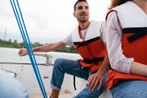 Man and woman on sailing boat — Stock Photo