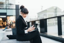 Businesswoman using digital tablet — Stock Photo