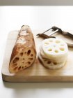 Sliced lotus root on table — Stock Photo