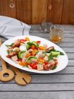 Plate of chicken and vegetables — Stock Photo