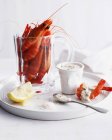 Glass with prawns and mayonnaise — Stock Photo