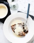 Bowl of bread and butter pudding — Stock Photo