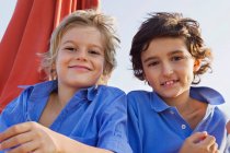 Two relaxed kids smiling — Stock Photo