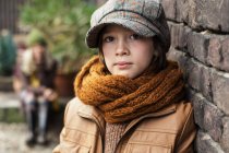 Boy wearing flat cap and scarf — Stock Photo