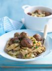 Bowl of pasta with meatballs — Stock Photo
