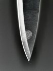 Відбиток пальця на лезі ножа — стокове фото