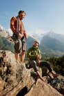 Rock climbers resting in mountains — Stock Photo