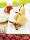 Cooked pears and biscuits — Stock Photo