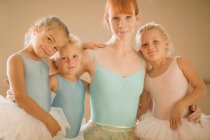 Ballet teacher with students — Stock Photo