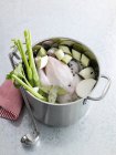 Chicken and vegetables for stock in pot — Stock Photo