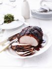 Sliced roast turkey on plate — Stock Photo