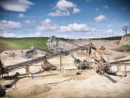 Machinery and equipment in quarry — Stock Photo