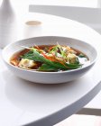 Wonton soup in white bowl — Stock Photo