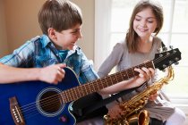 Children playing music together — Stock Photo