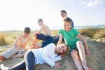 Five children on beach — Stock Photo