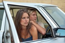Couple sitting in car — Stock Photo