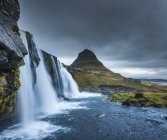 Kirkjufellsfoss waterfall with Mt. Kikjufell — Stock Photo