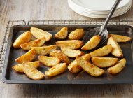 Seasoned potato wedges — Stock Photo