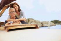 Middle aged couple on old boat — Stock Photo