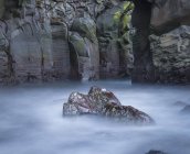 Rock in sea cave — Stock Photo