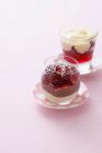 Berry jam with cream in glasses — Stock Photo