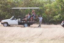 Young people on safari in off road vehicle, Stellenbosch, South Africa — Stock Photo