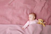 Baby girl sleeping in bed — Stock Photo