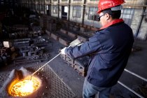 Working in cast iron foundry — Stock Photo