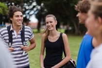 Friends talking in park, selective focus — Stock Photo