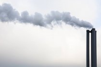 Smoke coming from industrial chimney — Stock Photo