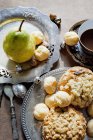 Muffins and pastry puffs with pear — Stock Photo