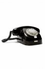Vintage negro Teléfono aislado en blanco - foto de stock