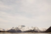 Snowcapped mountains and fjord — Stock Photo