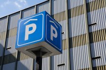 Low angle view of Parking lot sign — Stock Photo