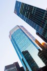 Skyscrapers angular view with clear sky — Stock Photo