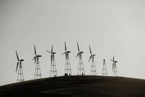 Wind turbines on hill — Stock Photo