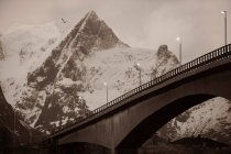 Mountain bridge in sepia, Reine, Lofoten, Norway — Stock Photo