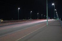 Ponte iluminada sobre o rio Reno à noite
, — Fotografia de Stock