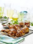 Barbecue glazed chicken on table — Stock Photo