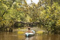 Teenage boy in kayak, Econfina Creek, Youngstown, Florida, USA — Stock Photo