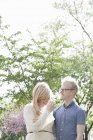 Young couple in park — Stock Photo