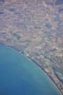 Aerial view of sea coastline and land — Stock Photo