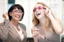 Two smiling women in eyeglasses — Stock Photo