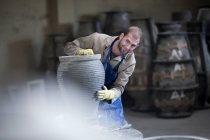 Sculpting and shaping pottery — Stock Photo