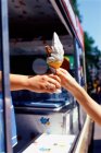 Child reaching for an ice cream — Stock Photo