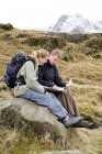 A couple looking at a map — Stock Photo