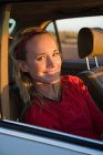 A woman in a car — Stock Photo