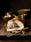 Carved chicken roast on kitchen table — Stock Photo