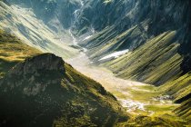 Aerial view of grassy mountain valley — Stock Photo